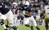 Penn State Nittany Lions running back Nicholas Singleton (10) runs the ball in the second half against the Notre Dame Fighting Irish  in the Orange Bowl at Hard Rock Stadium. (Mandatory Credit: Nathan Ray Seebeck-Imagn Images)
