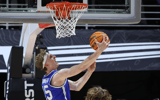 Jan 18, 2025; Salt Lake City, Utah, USA; Brigham Young Cougars forward Richie Saunders (15) lays the ball up during overtime at Jon M. Huntsman Center. Mandatory Credit: Rob Gray-Imagn Images