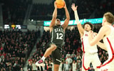 Josh Hubbard tries to score over Alabama in SEC action, via Wesley Hale-Imagn Images