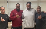 South Carolina coaches with four-star DT target Noah Clark (Photo: Noah Clark | X)