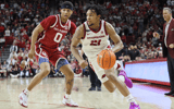 Arkansas PG DJ Wagner drives to the lane vs. Oklahoma, via Nelson Chenault, Imagn Images