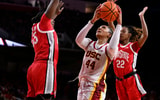 USC Trojans forward Kiki Iriafen (44) shoots between Ohio State Buckeyes forward Eboni Walker (55) and Ohio State Buckeyes guard Jaloni Cambridge (22) during the third quarter at Galen Center