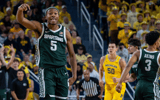 Michigan States Tre Holloman (5) celebrates after scoring a basket against Michigans defense during the second half of their matchup at Crisler Center in Ann Arbor, on Friday, Feb. 21, 2025 - David Rodriguez Munoz, USA TODAY Sports