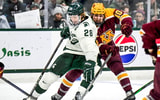 Michigan State's Karsen Dorwart, left, maneuvers around Minnesota's Connor Kurth during the second period on Saturday, Jan. 25, 2025, at Munn Arena in East Lansing - Nick King, USA TODAY Sports