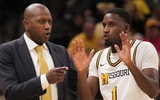 Feb 25, 2025; Columbia, Missouri, USA; Missouri Tigers head coach Dennis Gates talks with guard Marques Warrick (1) against the South Carolina Gamecocks during the second half at Mizzou Arena. Mandatory Credit: Denny Medley-Imagn Images