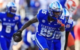 Kentucky Wildcats defensive back Jordan Lovett (25) reacts to an interception during the fourth quarter of an NCAA football matchup in the TaxSlayer Gator Bowl Friday, Dec. 29, 2023 at EverBank Stadium in Jacksonville, Fla. The Clemson Tigers edged the Kentucky Wildcats 38-35. [Corey Perrine/Florida Times-Union]