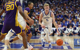 Kentucky guard Collin Chandler drives the ball vs. LSU - Dr. Michael Huang, Kentucky Sports Radio