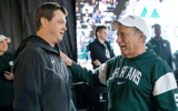 Michigan State men's basketball head coach Tom Izzo talks to hockey head coach Adam Nightingale during Izzone Campout at Munn Field near Breslin Center in East Lansing on Friday, Oct. 6, 2023. - Junfu Han, USA TODAY Sports
