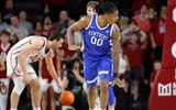 Feb 26, 2025; Norman, Oklahoma, USA; Kentucky Wildcats guard Otega Oweh (00) gestures after scoring against the Oklahoma Sooners during the second half at Lloyd Noble Center. Mandatory Credit: Alonzo Adams-Imagn Images