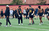 USC defensive backs prepare to go through drills at the Trojans' Pro Day