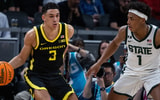Oregon Ducks guard Jackson Shelstad (3) dribbles the ball while Michigan State Spartans guard Jeremy Fears Jr. (1) defends in the first half at Gainbridge Fieldhouse. - Trevor Ruszkowski, USA TODAY Sports