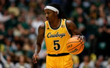 Feb 15, 2025; Fort Collins, Colorado, USA; Wyoming Cowboys guard Obi Agbim (5) dribbles the ball up court in the first half against the Colorado State Rams at Moby Arena. Mandatory Credit: Isaiah J. Downing-Imagn Images