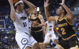 Nevada’s Nick Davidson tries to drive to the basket while taking on Wyoming at Lawlor Events Center in Reno on Feb. 25, 2025. © Jason Bean/RGJ / USA TODAY NETWORK via Imagn Images
