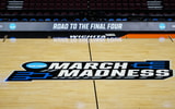Mar 19, 2025; Wichita, KS, USA; The March Madness logo at midcourt at the Intrust Bank Arena. Mandatory Credit: Kirby Lee-Imagn Images