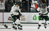 Michigan State forward Isaac Howard celebrates after scoring the game-winning goal against Ohio State, Saturday, March 22, 2025, winning the Big 10 Hockey Championship at Munn Ice Arena. Also pictured is David Gucciardi. - Matthew Dae Smith, USA TODAY Sports