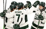 Michigan State's Matt Basgall, left, celebrates his goal with teammates David Gucciardi, center, and Tiernan Shoudy during the first period in the game against Minnesota on Saturday, Jan. 25, 2025. - Nick King, USA TODAY Sports