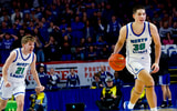 Kole Jervis (left) and Reece Davidson celebrate North Laurel's first-ever Sweet 16 victory - Les Nicholson, Kentucky Sports Radio