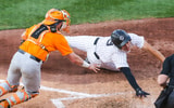 South Carolina baseball's Evan Stone sliding around a tag at home plate against Tennessee. Photo by Katie Dugan | GamecockCentral