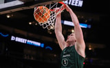 Michigan State Spartans forward Jaxon Kohler (0) dunks during NCAA Tournament South Regional Practice at State Farm Arena. - Brett Davis, USA TODAY Sports
