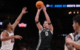 Michigan State Spartans forward Jaxon Kohler (0) shoots against Auburn Tigers center Dylan Cardwell (44) during the second half in the South Regional final of the 2025 NCAA tournament at State Farm Arena. - Brett Davis, USA TODAY Sports
