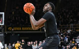 Michigan State Spartans forward Xavier Booker (34) shoots the ball against the Iowa Hawkeyes during the first half at Carver-Hawkeye Arena. - Jeffrey Becker, USA TODAY Sports
