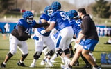 Alex Wollschlaeger and the Kentucky offensive line, via Aaron Perkins, KSR
