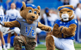 Nov 16, 2024; Lexington, Kentucky, USA; The Kentucky Wildcat and Scratch mascots pose for a photo before the game against the Murray State Racers at Kroger Field. Mandatory Credit: Jordan Prather-Imagn Images
