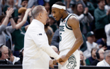 Michigan State Spartans head coach Tom Izzo talks with Michigan State Spartans guard Tre Holloman (5) in the second half against the Bryant University Bulldogs during the NCAA Tournament. - Rick Osentoski, USA TODAY Sports
