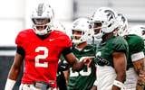 Michigan State quarterback Aidan Chiles, left, talks with Nick Marsh during a break in football practice on Tuesday, April 8, 2025, in East Lansing. - Nick King, USA TODAY Sports