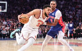 Karl-Anthony Towns drives to the basket in a Knicks playoff win, via Wendell Cruz-Imagn Images