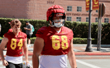 USC offensive lineman Hayden Treter walks to a spring practice with the Trojans