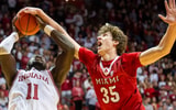 Indiana's Oumar Ballo (11) is fouled by Miami's Reece Potter (35) during the Indiana versus Miami (Ohio) men's basketball game at Simon Skjodt Asseembly Hall on Friday, Dec. 6, 2024 | Rich Janzaruk/Herald-Times / USA TODAY NETWORK via Imagn Images
