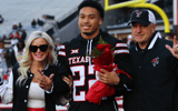 Nov 30, 2024; Lubbock, Texas, USA; Texas Tech Red Raiders defensive back Devynn Cromwell (22) is honored on senior day before the game against the West Virginia Mountaineers at Jones AT&T Stadium and Cody Campbell Field. (Photo Credit: Michael C. Johnson-Imagn Images)