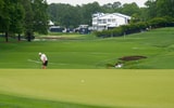 May 12, 2025; Charlotte, North Carolina, USA; Timothy Wiser practices pitching up to the 18th green during a practice round for the PGA Championship golf tournament at Quail Hollow. Mandatory Credit: Jim Dedmon-Imagn Images