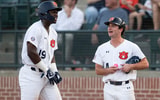 Auburn first base coach Andrew Dutton