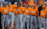 (Gary Cosby Jr. / USA TODAY NETWORK via Imagn Images) May 22, 2025; Hoover, AL, USA; Tennessee shortstop Gavin Kilen (6) is congratulated by teammates after hitting a solo homer to give Tennessee the lead in the 10th inning in the third round of the SEC Baseball Tournament at the Hoover Met. Tennessee eliminated Texas with a 12-inning 7-5 victory. Kilen drove in all three runs in extra innings.