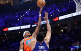 Jan 3, 2025; Oklahoma City, Oklahoma, USA; Oklahoma City Thunder guard Shai Gilgeous-Alexander (2) shoots as New York Knicks center Karl-Anthony Towns (32) defends during the second half at Paycom Center. Mandatory Credit: Alonzo Adams-Imagn Images