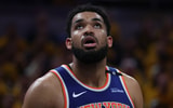 May 27, 2025; Indianapolis, Indiana, USA; New York Knicks center Karl-Anthony Towns (32) looks up at a scoreboard during the third quarter against the Indiana Pacers of game four of the eastern conference finals for the 2025 NBA Playoffs at Gainbridge Fieldhouse. Mandatory Credit: Trevor Ruszkowski-Imagn Images