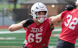 Cooper Hackett going through drills