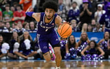 High Point Panthers guard Kezza Giffa (1) brings the ball upcourt against the Purdue Boilermakers during the first half at Amica Mutual Pavilion