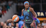 May 22, 2025; Atlanta, Georgia, USA; Atlanta Dream guard Rhyne Howard (10) dribbles against the Indiana Fever in the first half at State Farm Arena. Mandatory Credit: Brett Davis-Imagn Images