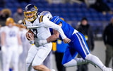 Cincinnati Moeller's Matt Ponatoski (7) runs the ball against Olentangy Liberty in the first half of the Division I State Championship game at Tom Benson Hall of Fame Stadium on Friday, Dec. 6, 2024 in Canton, Ohio. © Samantha Madar/Columbus Dispatch / USA TODAY NETWORK via Imagn Images