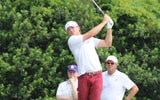 Luke Clanton hits an iron shot on hole eight of Seminole Legacy (Matt LaSerre/Warchant)