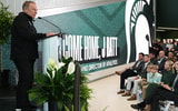 Michigan State University basketball coach Tom Izzo speaks Wednesday, June 4, 2025, before MSU President Kevin Guskiewicz introduced J Batt (bottom right) as the Spartans new athletic director. - Matthew Dae Smith