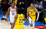Jun 5, 2025; Oklahoma City, Oklahoma, USA; Indiana Pacers guard Tyrese Haliburton (0) and forward Aaron Nesmith (23) celebrate after Haliburton makes the game winning shot as Oklahoma City Thunder guard Cason Wallace (22) looks on during the fourth quarter during game one of the 2025 NBA Finals at Paycom Center. Mandatory Credit: Alonzo Adams-Imagn Images