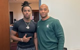 Michigan State DB commit Jordan Vann with Spartan safeties coach James Adams (photo courtesy of Jordan Vann via Twitter).