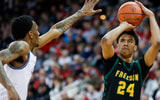 Freedom High School's Donovan Davis (24) shoots the ball against Milwaukee Academy of Science during the WIAA Division 3 state championship game on Saturday, March 22, 2025, at the Kohl Center in Madison, Wis. Milwaukee Academy of Science won the game, 57-54. Tork Mason/USA TODAY NETWORK-Wisconsin