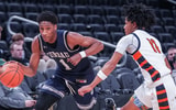 Milwaukee Juneau's Dooney Johnson (1) races Racine Park's Jwan Eastland (11) downcourt during their Deer District Prep Showcase game at Fiserv Forum in Milwaukee, WI. on Saturday, Feb. 8, 2025. Racine Park won the game, 70-55. © Scott Ash / Milwaukee Journal Sentinel / USA TODAY NETWORK via Imagn Images