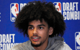asa-newell-beams-in-jewelry-laden-slim-purple-suit-ahead-of-2025-nba-draft