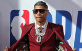 Jeremiah-Fears-shows-off-burgundy-suit-No-0-chain-prior-to-NBA-Draft